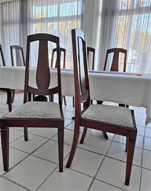 10 x mahogany wooden dining chairs . Recently recovered in great condition. 