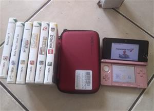 Nintendo 3DS with 6 games + Nintendo 3ds pouch + a charger