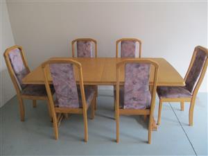 Extending dinning room suite with six chairs and side table 