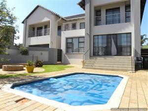 Stunning and modern 4  bedroom double storey house in Montana Park with pool and double garage.