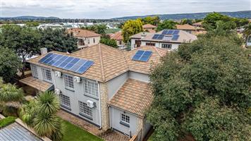 Versatile 4-Bedroom Double-Storey Home with Solar & 3 Garages in Bougainvillea Estate