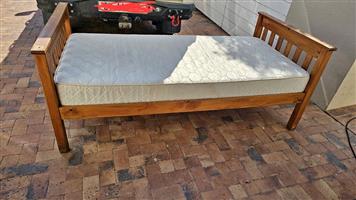 Single wooden bed