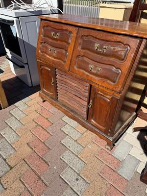 Vintage solid wood drinking cabinet wth falling doors