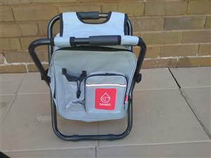 Camping stool and cooler bag.