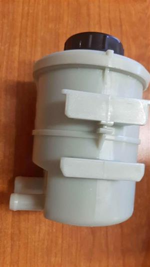 NP200 POWER STEERING BOTTLE. BRAND NEW. FOR VARIOUS OTHER CARS TOO.