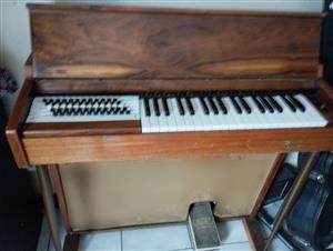 Antique electric piano organ