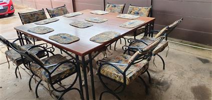 Steel Patio set, table top is Chamfuti wood.  Size of table 174 x 174cm