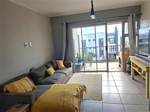 Modern First-Floor Apartment with Spacious Patio & Built-In Braai and Two Basement Parking bays