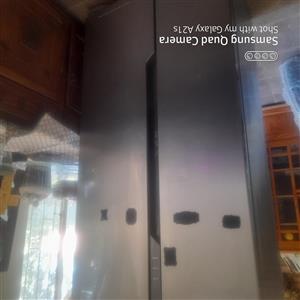 Double door fridge freezer  Needs a new compressor then ready to go .