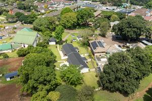 Rare Commercial Zoning Central Property with level acre