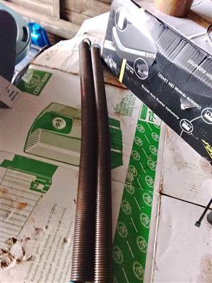 Tension springs for garage door