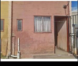 A 1 BEDROOM FLAT WITH KITCHEN AND DINING ROOM AT DURBAN DEEP FOR SALE