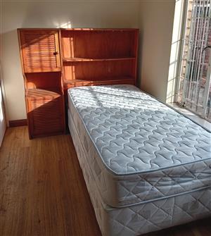 Single bed with table chair