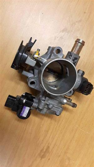 TOYOTA RUNX THROTTLE BODY. SECOND HAND. STILL IN GOOD CONDITION.