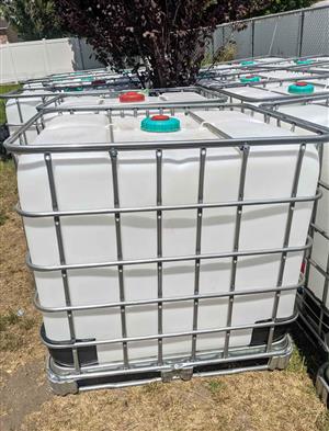 like new 275 gal food grade, safe drinking water totes.