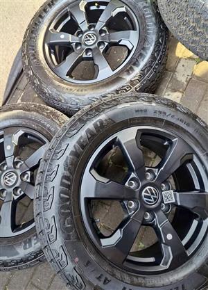 18 inch VW Amarok Aventura original Black mags with 255/65/18 Goodyear Wrangler ATs tyres set 
