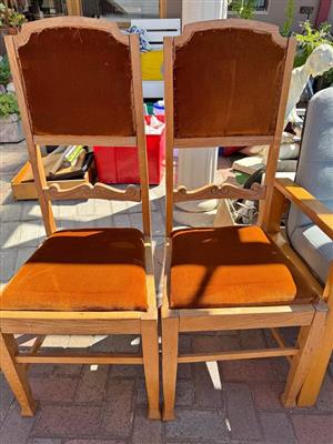Pair of antique dining chairs in burn orange