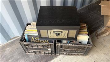 Old records and a Crosley record player.