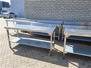 Stainless steel tables 4× 1.85m and 4 × 2.25m