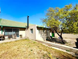 Spacious Family Home with Multiple Living Areas and indoor braai area for sale in Secunda
