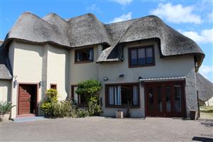 Exquisite thatch home on this 25ha lifestyle farm near Port Alfred