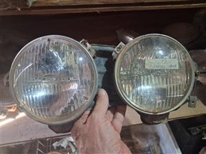 Duel headlights with holder