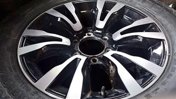 18" Isuzu X-Rider original mag with used 255/60/18 tyre to use for spare 