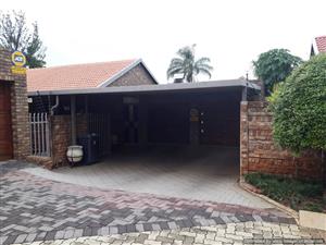 Stunning 3 bedroom full title townhouse with double garage and carport in Montana Park