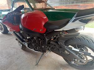 Suzuki 750 GSXR bike as is starts and drives, papers on hand. Needs fairing kit.