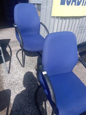 Bright blue arm chairs