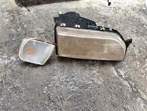 Ford sapphire right head light and left corner light both
