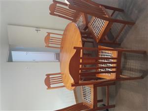 Solid wood round table and six chairs for sale