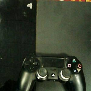 Playstation PS4 with controller and Fifa game