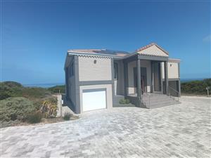 Spacious Double-Storey 5-Bedroom Home with Panoramic Sea Views