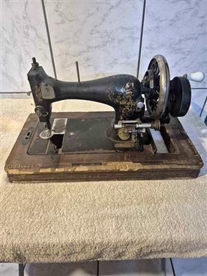 Antique Frister & Rossmann sewing machine.