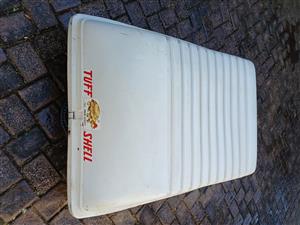 Tuff-shell, fully lockable storage unit with built-in wheels for easy mobility. 