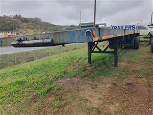 T809- 1972- HENRED FRUEHAUF SEMI TRAIL FLATEDECK TRAILER