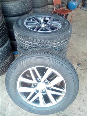 18" Toyota Hilux/Fortuner original mags with 265/60/18 Dunlop Grandtreck A/T set 
