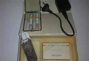 puffaway gift set with charger and case and oil in vgc