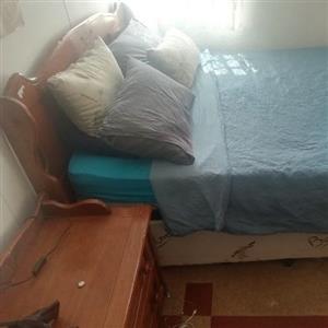 Queen size bed with side tables and head board 