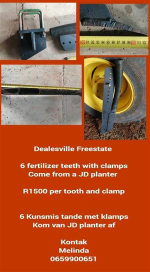 6 Fertilizer teeth with clamps Come from a JD planter