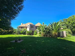 Luxury Entertainer’s Dream in Prestigious Three Rivers Proper.