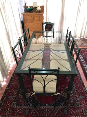 Glass top patio table with 8 chairs for sale
