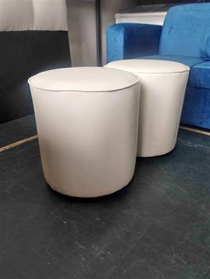 Round ottomans- white vinyl