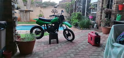 1986 kawasaki kx60, running good needs front tire and rear plastic cracked