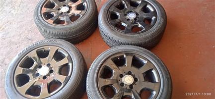 Original set of 16inch Mercedes mag wheels with fairly used Tyres for sell