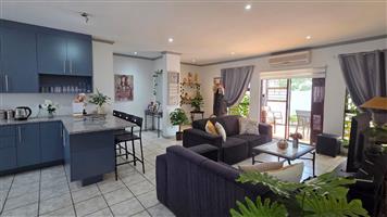 Full Title Home with Double Garage and enclosed Entertainment Area!