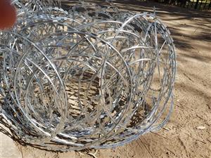 Razor wire manufacturing machines