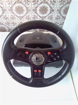 PS2 and PC Steering Wheel. Built-in Connection Cable for PS2 and Plug for PC .