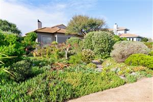 Fairway frontage  Home With Landscaped Garden